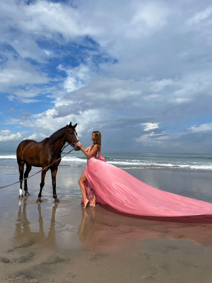Pink dress and horse