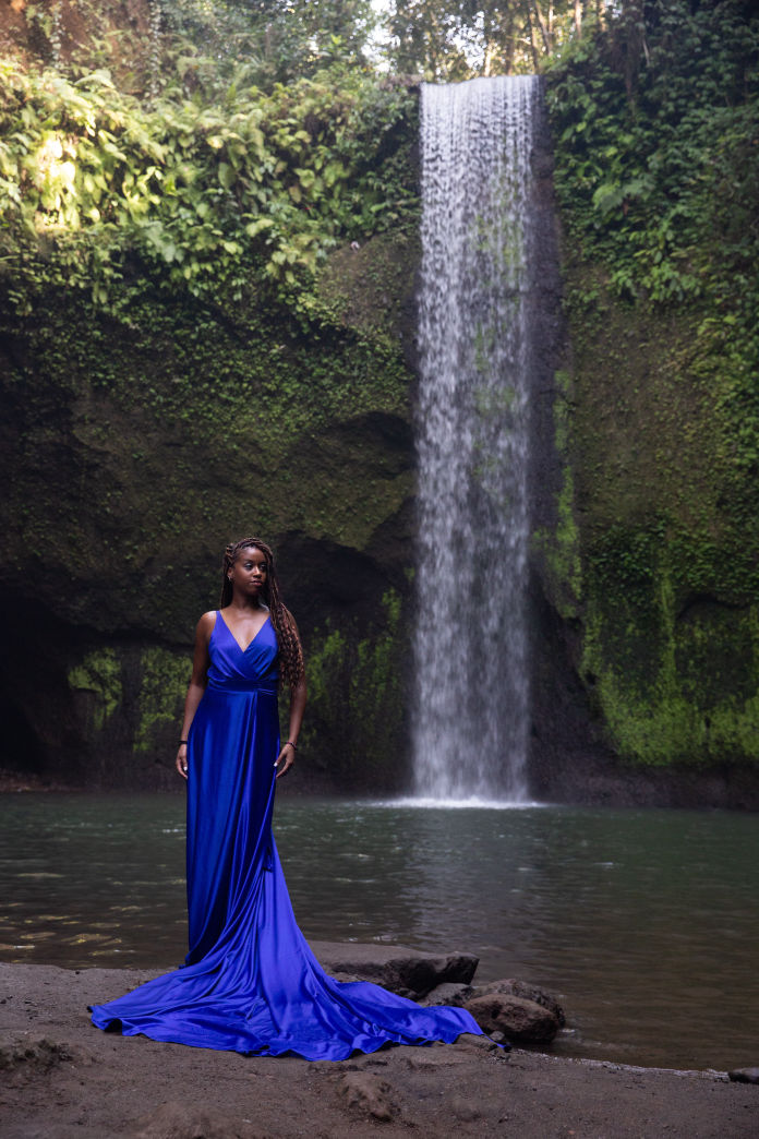 Blue dress and waterfall